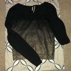 Black and gold sweater